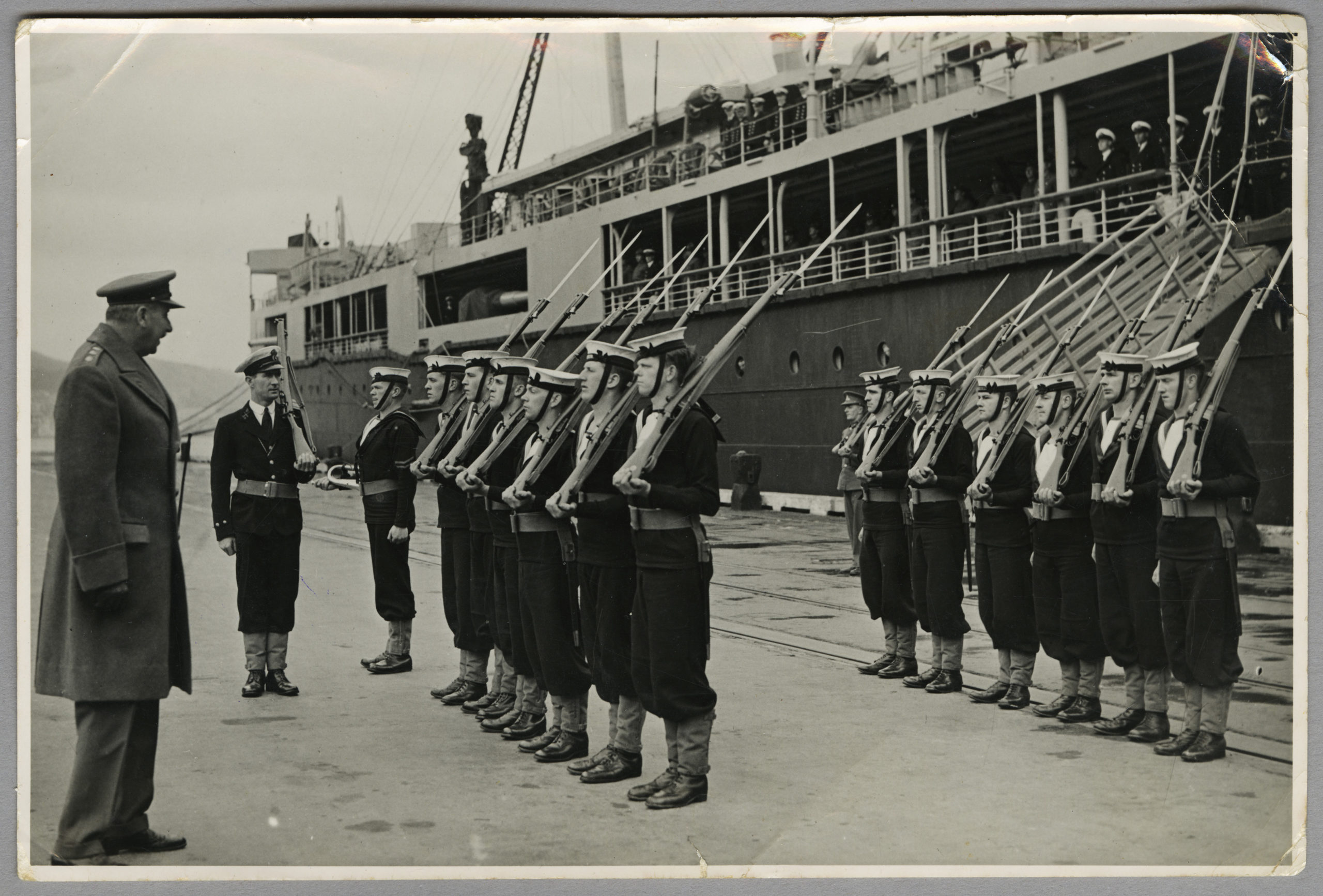 AAH 0027 - HMS MONOWAI ca. 1941 Sailors on the wharf in front of HMS Monowai 1941