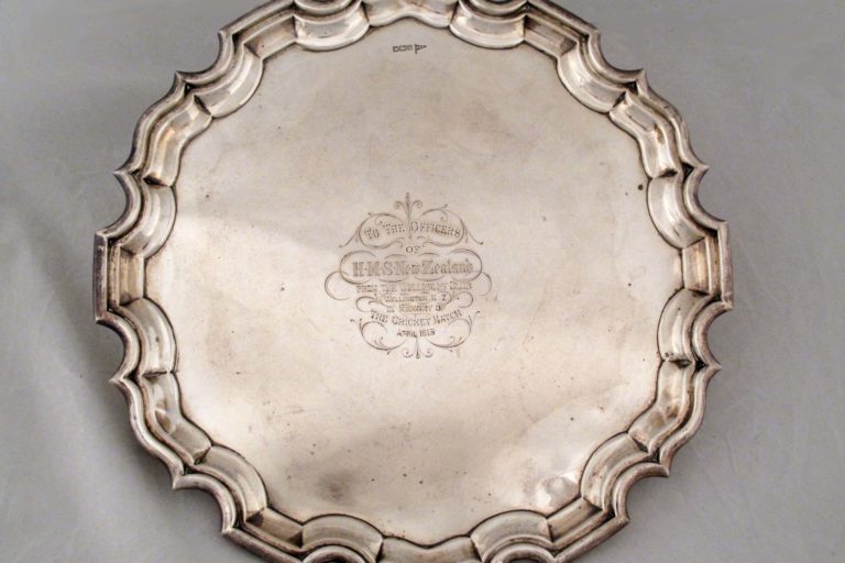 FT-0328-iii Silver salver with scalloped and turned up edges presented to HMS New Zealand.